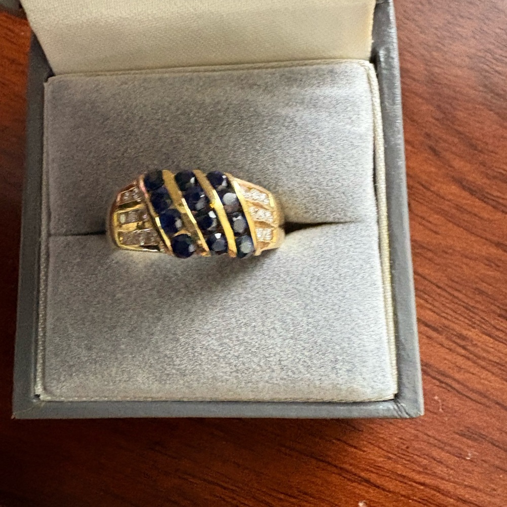Sapphire   and diamond band. From banks and bittles. Size 6